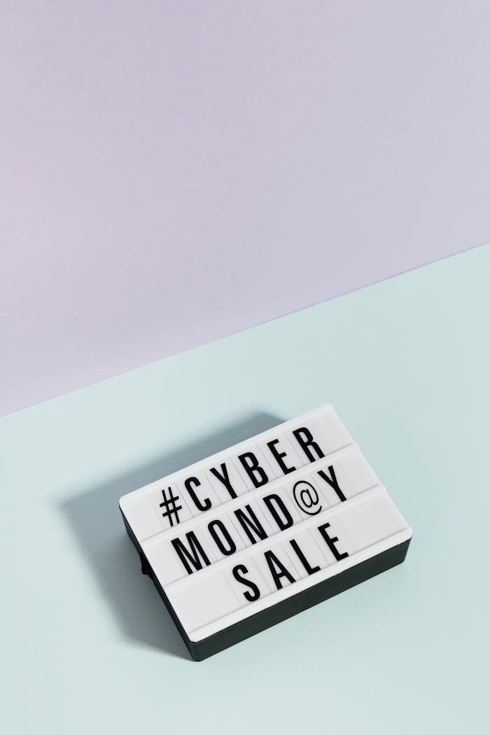 A minimalist lightbox showcasing Cyber Monday Sale against a pastel background, perfect for online shopping promotions.